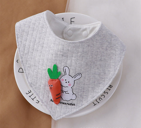 Gray baby bib with cartoon rabbit and carrot design on a white background