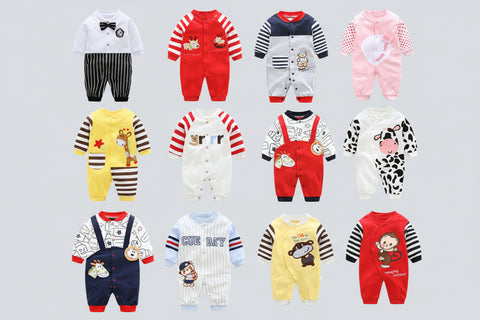 Collection of colorful baby rompers with various designs on a white background