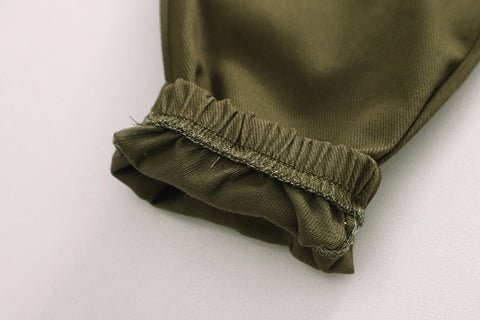 Completo con top in morbido cotone con stampa di dinosauri e pantaloni con elastico in vita