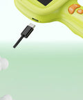 Green electronic device with USB-C cable on a light green background