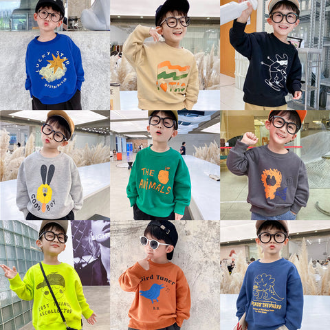 Collage of a young boy wearing different sweatshirts with various designs in various settings.