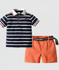 Children's outfit with striped polo shirt and orange shorts on a white background