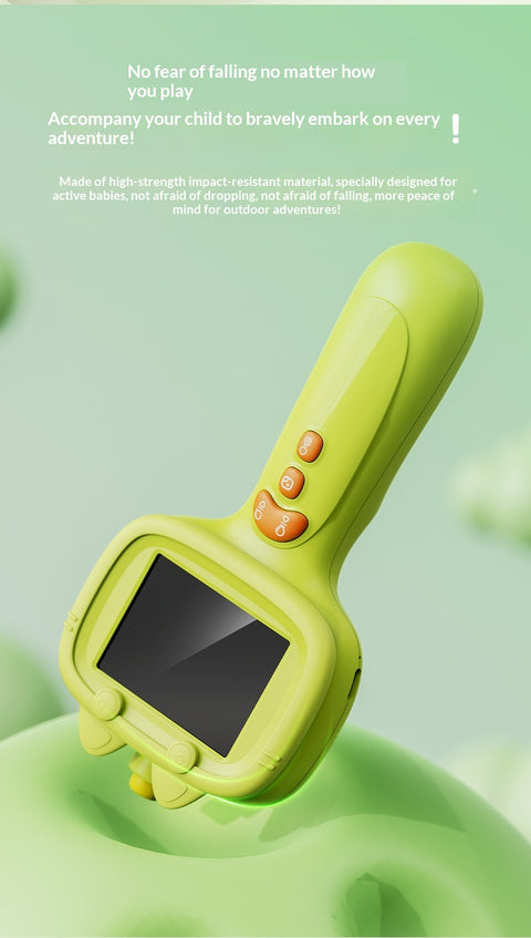 Green toy with screen and buttons on a green background