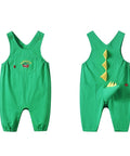 Green children's overalls with dinosaur design on a white background