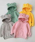 Four colorful children's hoodies with animal ear designs on a white background.