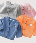 Four children's cardigans in gray, pink, blue, and orange on a white background.