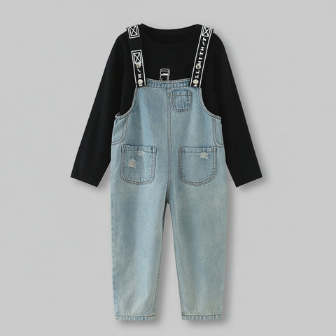 Black long-sleeve shirt with suspenders and light blue denim overalls on a white background