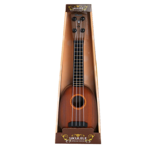 Ukulele in packaging on a white background