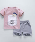 Children's pink t-shirt with graphic and gray shorts on a white background