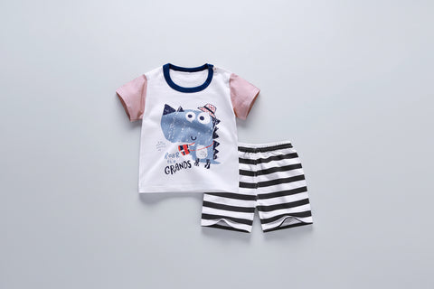 Children's outfit with t-shirt and striped shorts on a white background