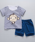 Children's outfit with striped shirt and blue shorts on a white background