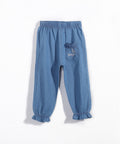Blue denim pants with a pocket on a white background