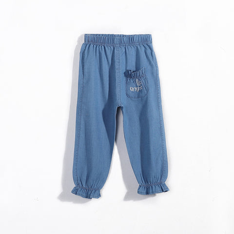 Blue denim pants with a pocket on a white background