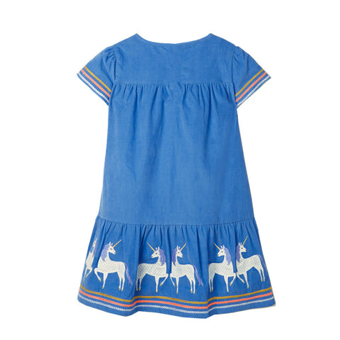 Blue dress with unicorn designs on a white background