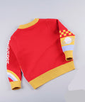 Red and yellow sweater with checkered pattern on a white background