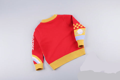 Red and yellow sweater with checkered pattern on a white background