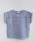 Blue and white striped sleeveless shirt on a light gray background