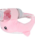 Pink plush shark toy with a transparent bottle attached on a white background