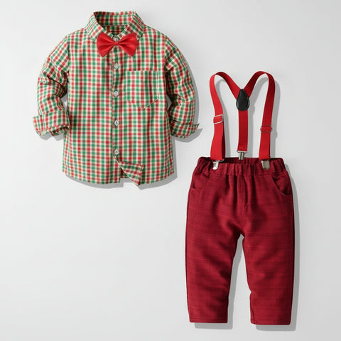 Children's outfit with red and green checkered shirt, red bow tie, and red pants with suspenders on a white background.