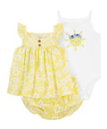 Baby outfit with yellow floral dress and white shirt on a white background