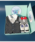 Baby boy outfit set with vest, shoes, and socks in a box