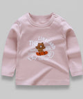 Pink long-sleeve shirt with a bear graphic and text on a white background