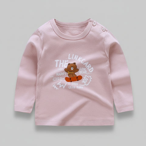 Pink long-sleeve shirt with a bear graphic and text on a white background