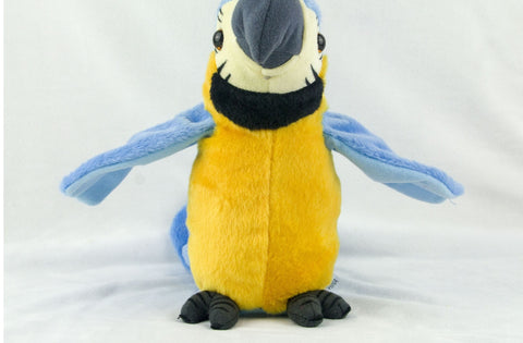 Plush toy parrot with blue wings and yellow body on a white background