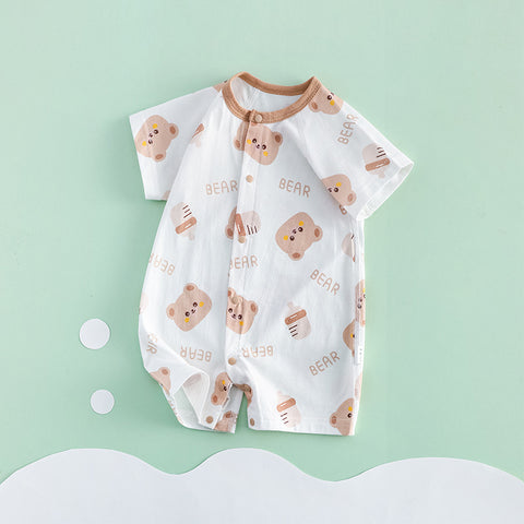 Baby romper with bear pattern on a light green background
