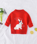 Red sweater with a white rabbit design on a light background