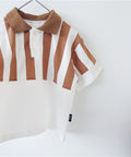 Striped shirt with brown and white vertical stripes.