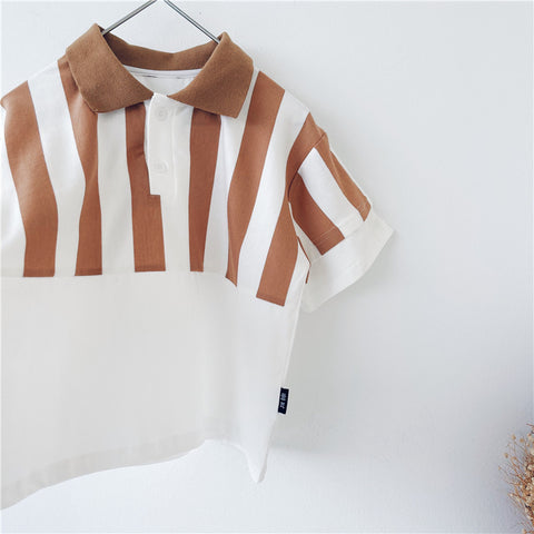 Striped shirt with brown and white vertical stripes.