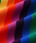 Multicolored striped fabric with rainbow pattern on a blue background