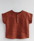 Brown short-sleeve shirt on a light gray background