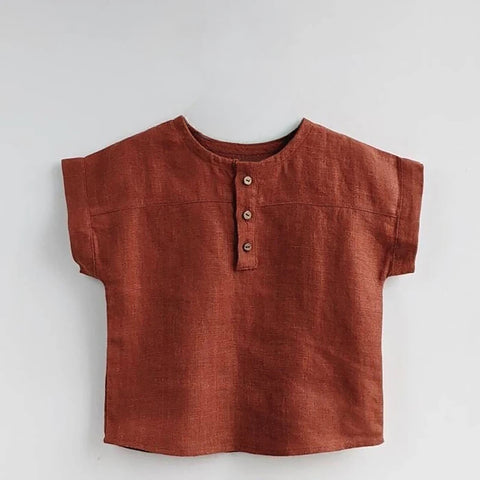 Brown short-sleeve shirt on a light gray background