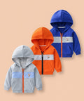 Three children's hoodies in blue, orange, and gray on a white background