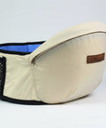 Beige baby carrier with blue interior 