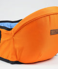 Orange pet carrier with black accents on a white background