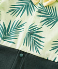 Clothing with green leaf pattern and black trim