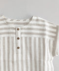 Striped shirt with buttons on a light gray background