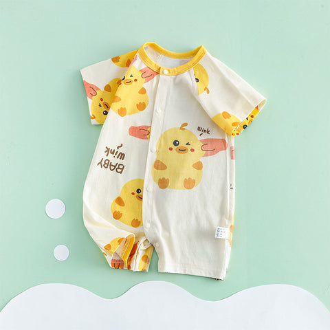 Baby romper with duck pattern on a light green background