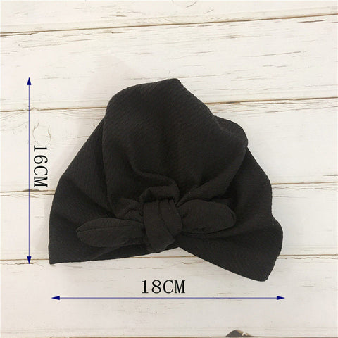 Elegante gorro transpirable para bebé con lazo
