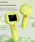 Two green toy devices with buttons and a screen on a light green background