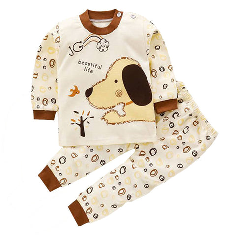 Children's pajama set with dog design on a white background
