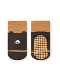 Pair of brown and black socks with a bear design on a white background