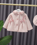 Pink children's outfit with matching hat 