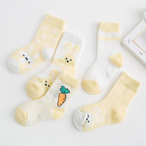 Set of baby socks with cartoon designs on a light background