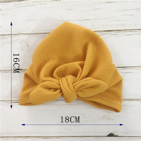 Elegante gorro transpirable para bebé con lazo