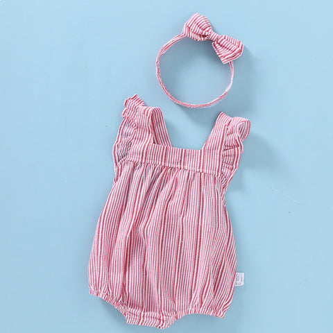 Pink striped baby romper with matching headband on a light blue background