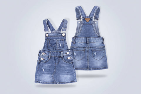 Two denim overalls on a white background